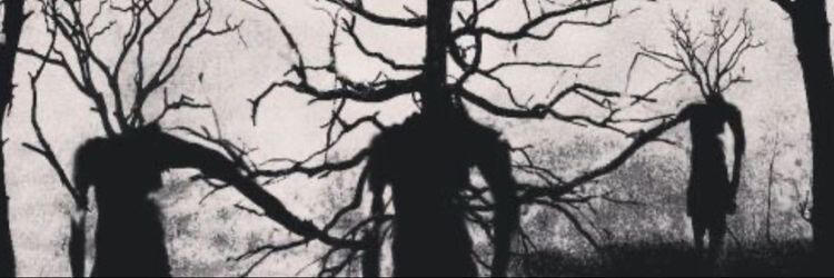 creepy picture of humans growing branches